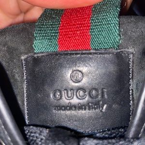 Low top all black Gucci shoes